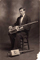 Boy In Suit Playing With Cigar Box Guitar